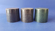 Plastic caps painted with black base-coat and various metal flake topcoats, including silver, green, and red and blue multicolor. VML jpg