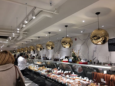 metallized lighting fixtures installed in high-end grocery store chain in Toronto. Custom motorized tooling and masks were used to finish parts.