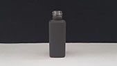 Painted glass nail polish bottle with black soft-touch paint finish. Vacuum Metallizing Lmited jpg 